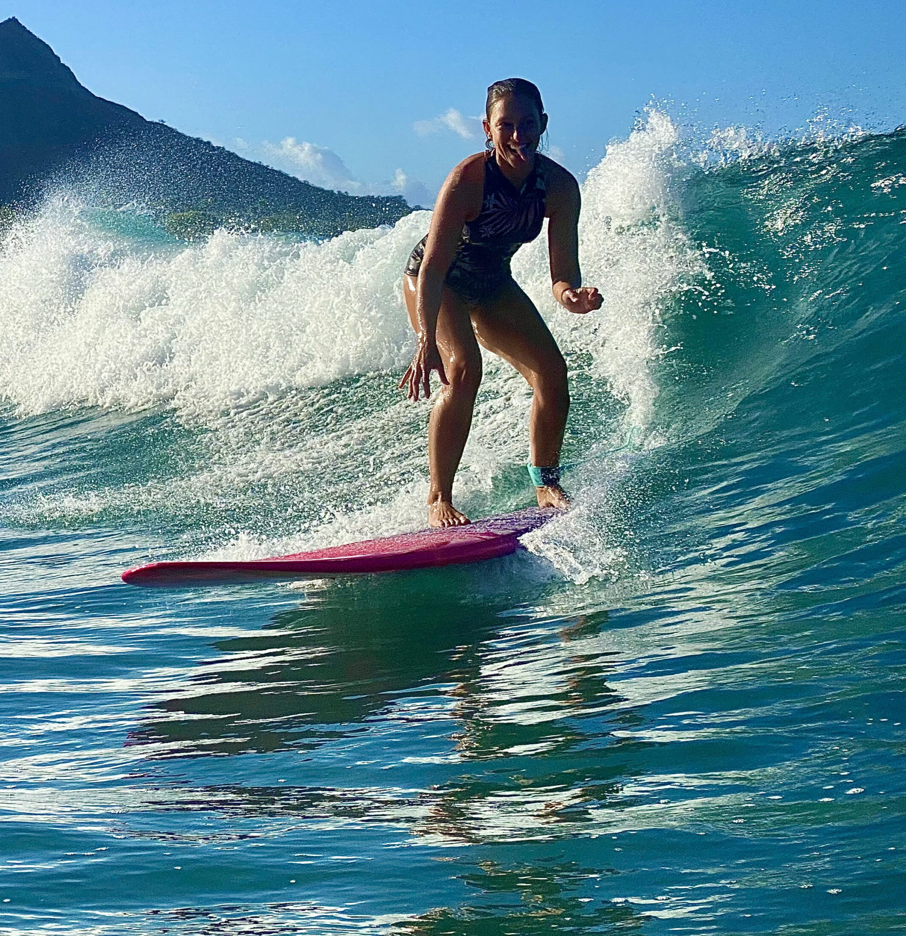 Woman surfing in Waikiki beach