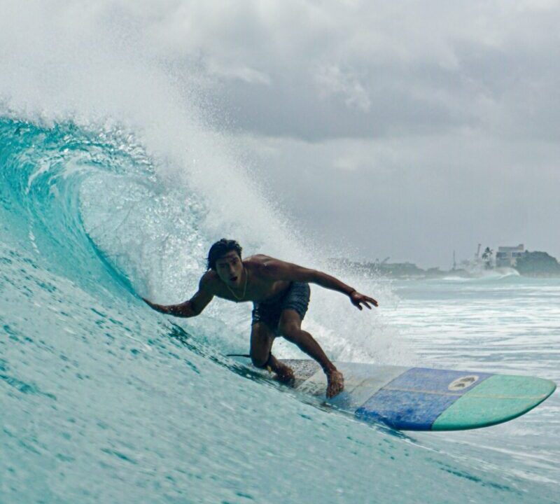 One of the best surfer's in waikiki surfing a wave